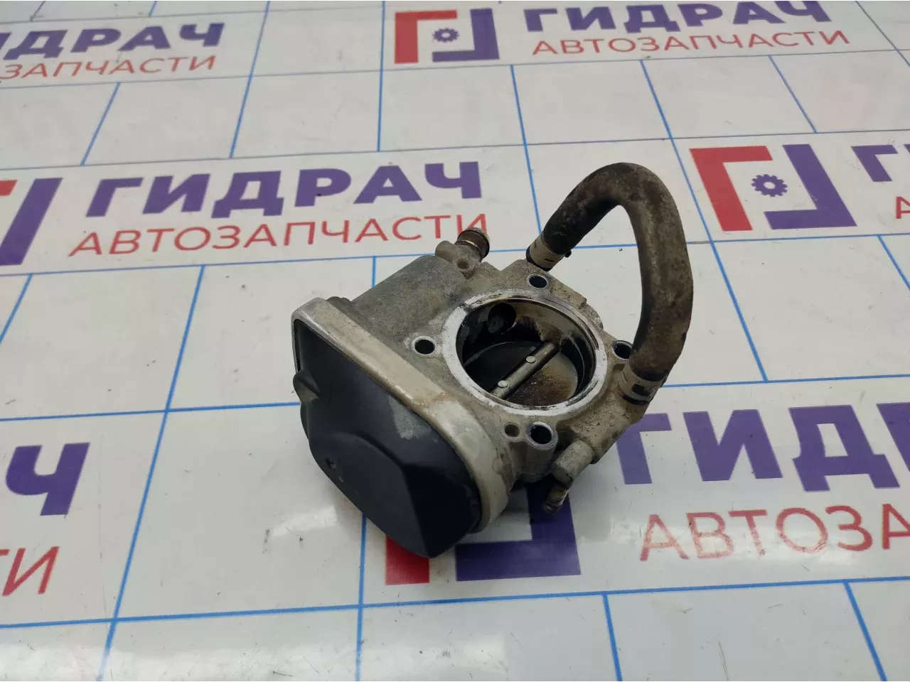 Заслонка дроссельная Opel Astra (H) 55560398